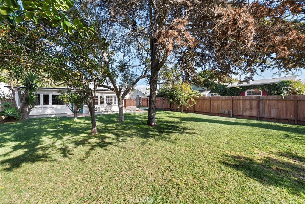 1209 C. Toledo San Clemente, CA 92672 - Photo 43 of 47 a view of a house with a yard