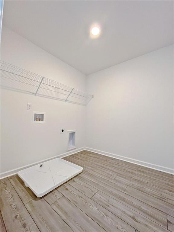 117 Goshawk Street Braselton, GA 30517 - Photo 24 of 28 wooden floor in an empty room