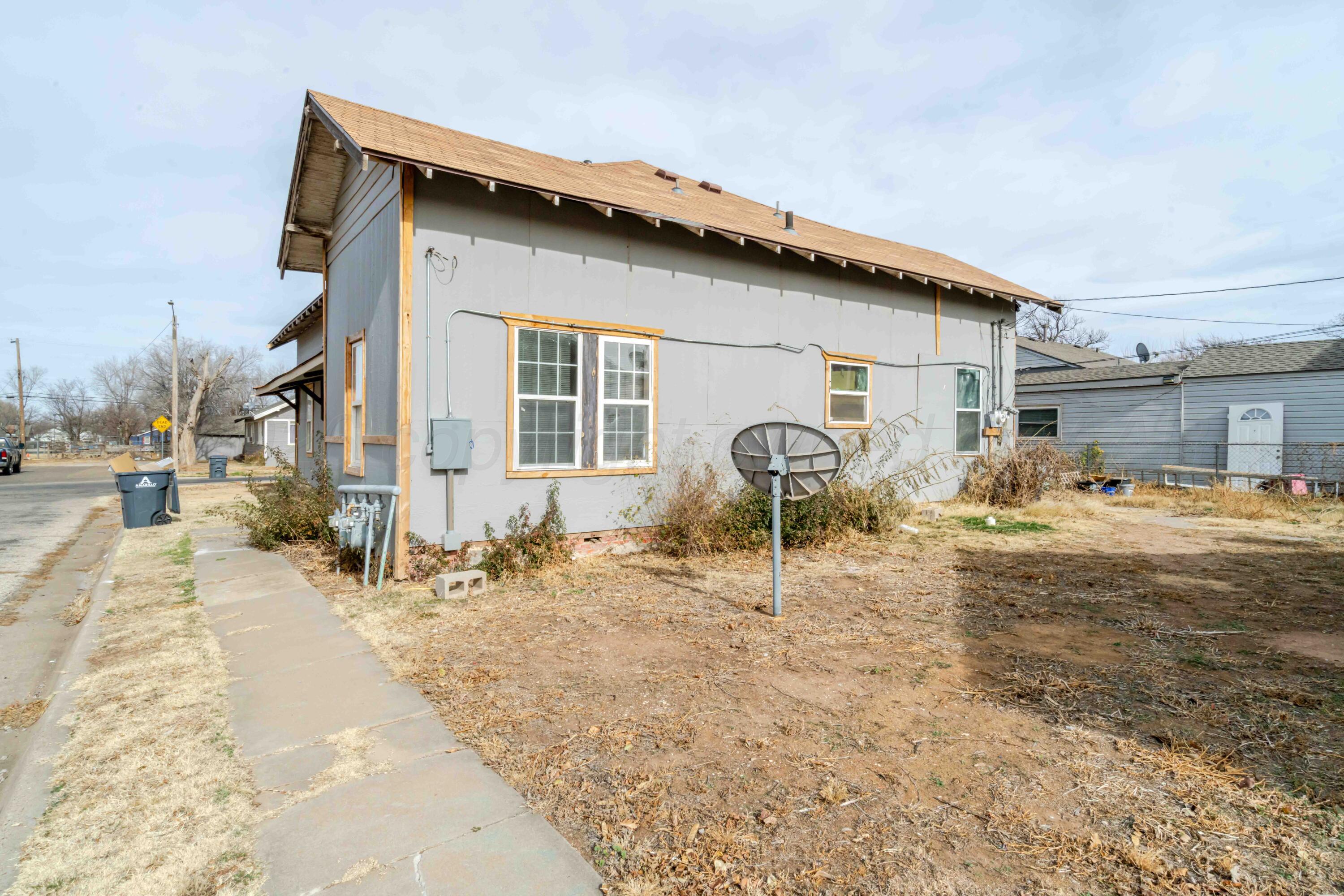 1111 Southwest 13th Avenue Amarillo, TX 79102 - Photo 20 of 20 a backyard of a house with table and chairs