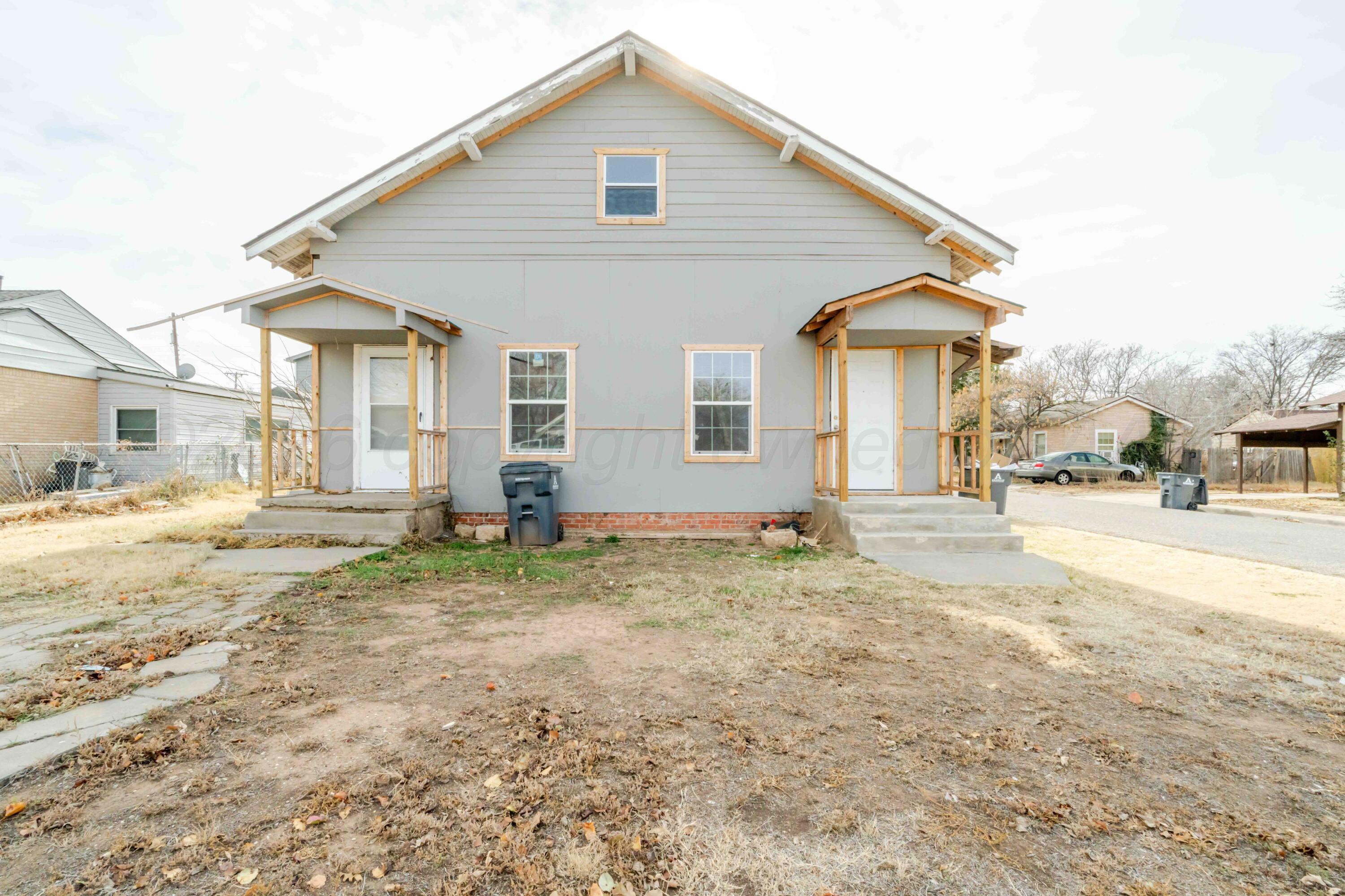 1111 Southwest 13th Avenue Amarillo, TX 79102 - Photo 2 of 20 a view of a house with a yard