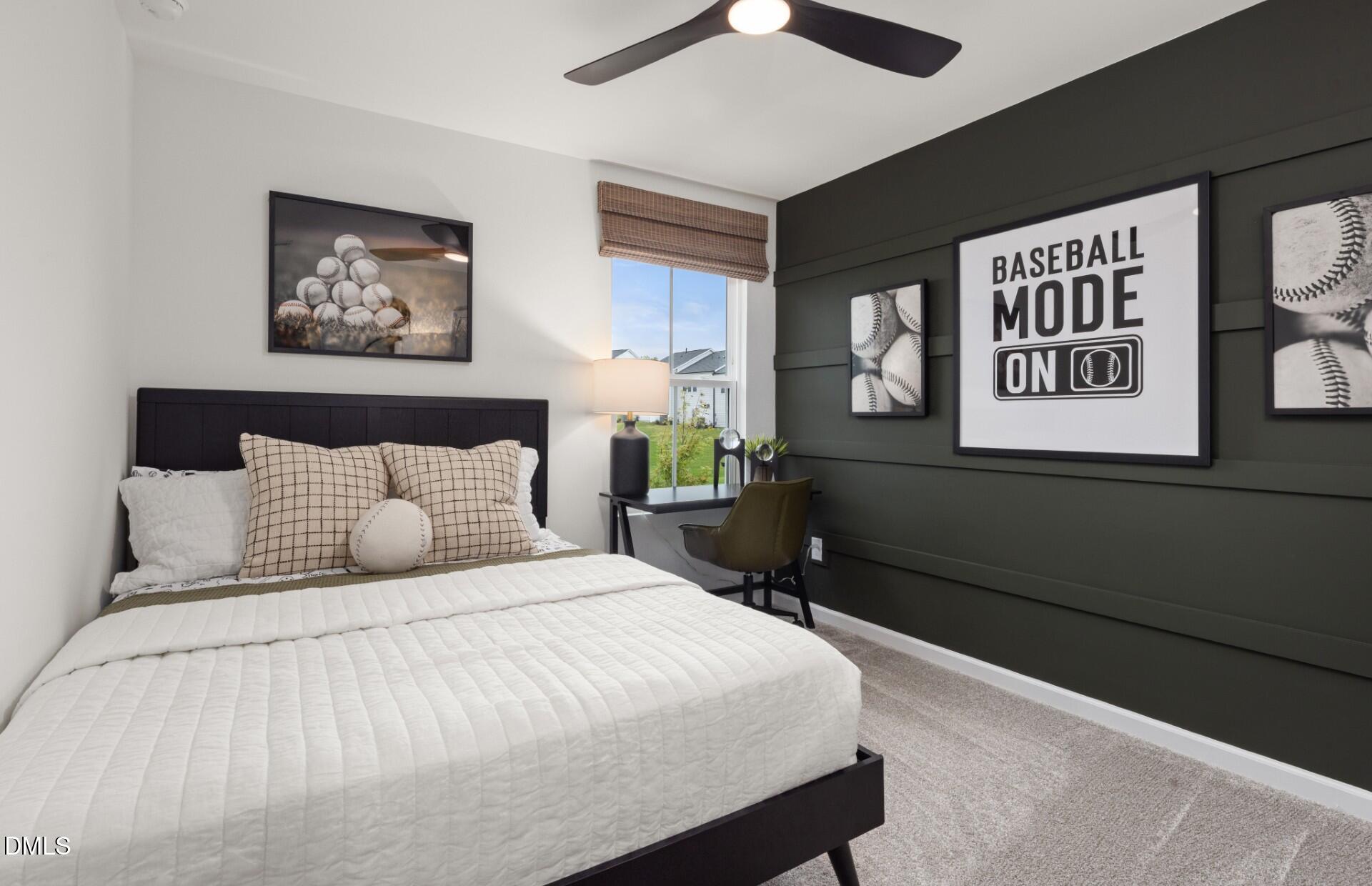 605 Timber Terrace Drive Durham, NC 27704 - Photo 13 of 31 a bedroom with a bed and a painting on the wall