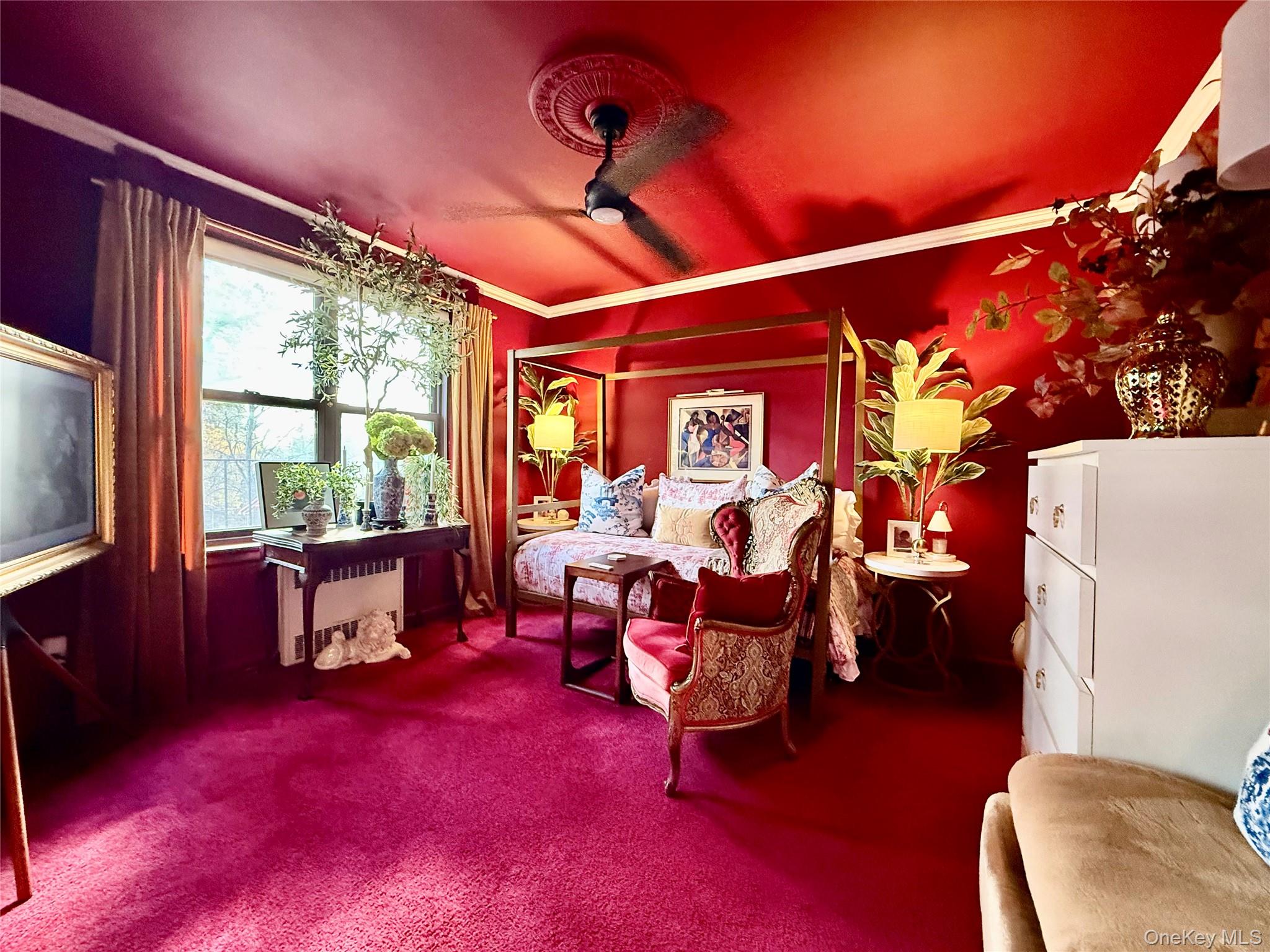 112-25 34th Avenue, Unit 2D Queens, NY 11368 - Photo 21 of 37 a bedroom with furniture and a window