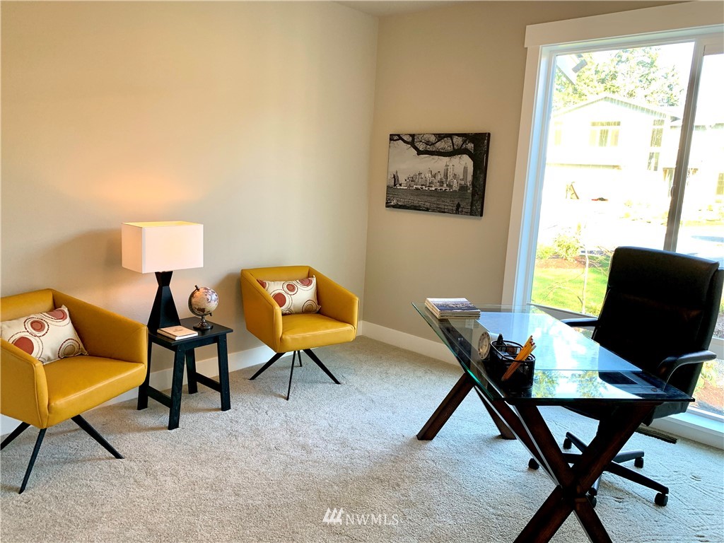 21632 2nd Court Southeast Bothell, WA 98021 - Photo 9 of 21 a living room with furniture and a window