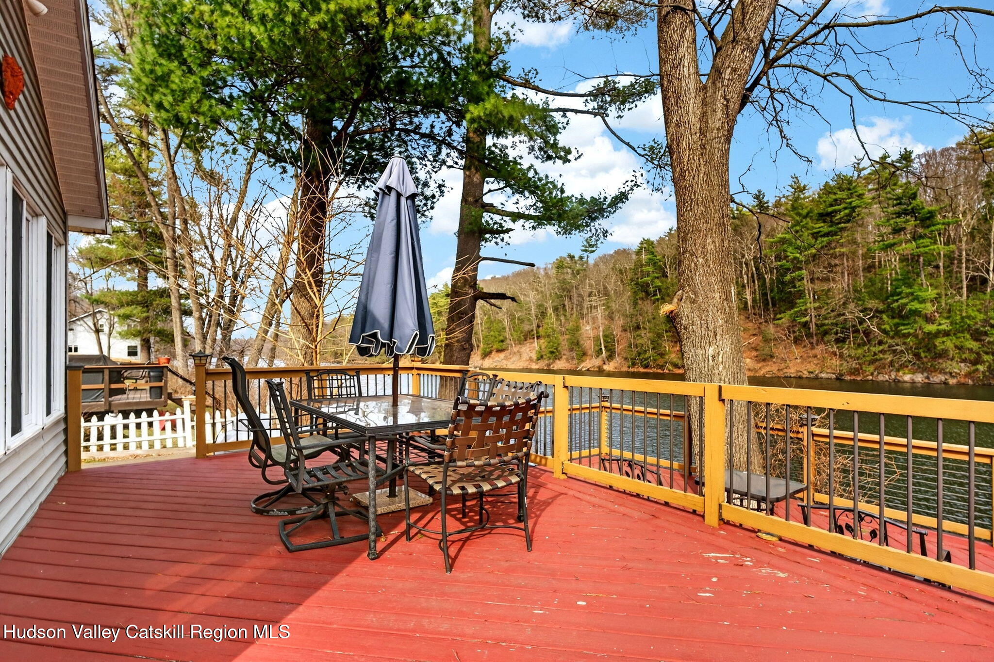 205 Esopus Creek Road Saugerties, NY 12477 - Photo 31 of 56 a view of a chairs and table on the wooden floor