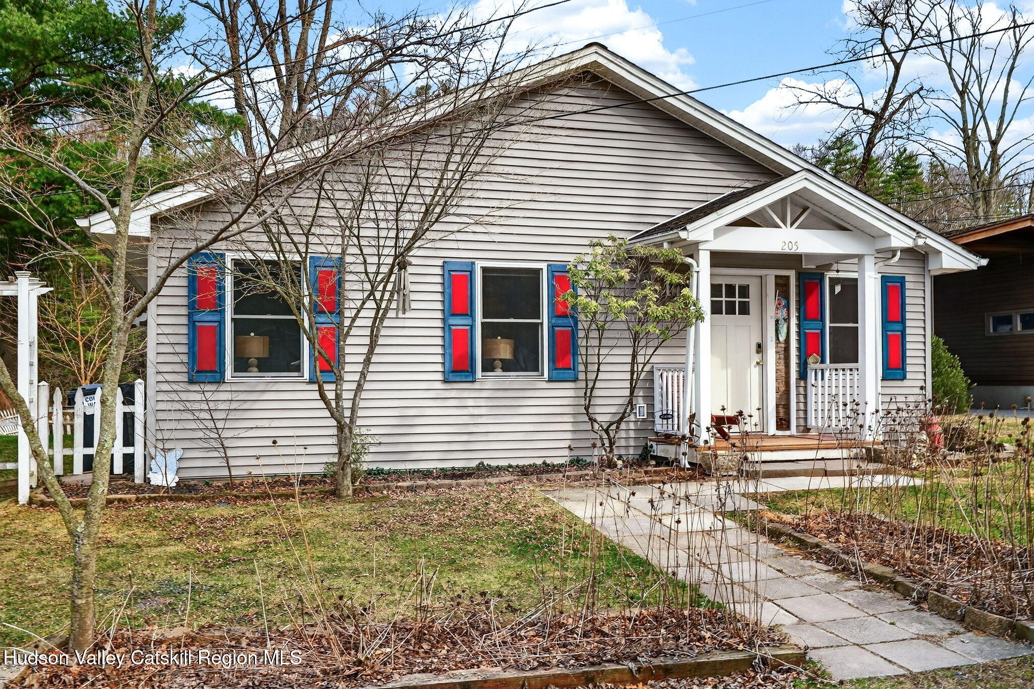 205 Esopus Creek Road Saugerties, NY 12477 - Photo 53 of 56 a front view of a house with a yard
