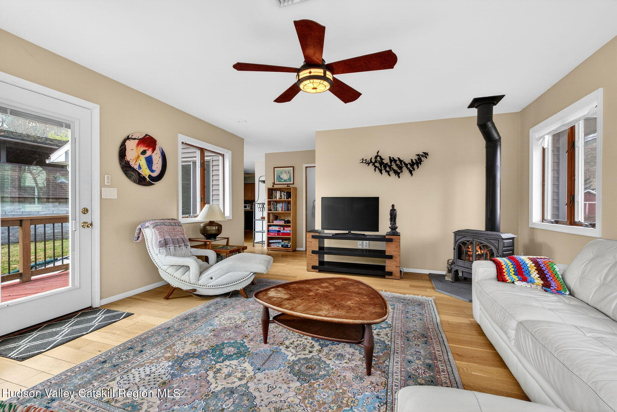 205 Esopus Creek Road Saugerties, NY 12477 - Photo 10 of 56 a living room with furniture and a flat screen tv