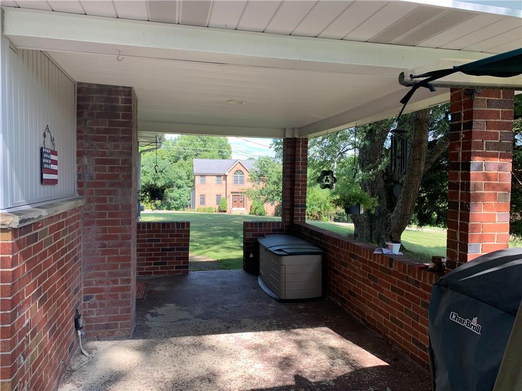 187 Warren Road Warrendale, PA 15086 - Photo 14 of 16 This is the side porch which can be accessed from the kitchen.