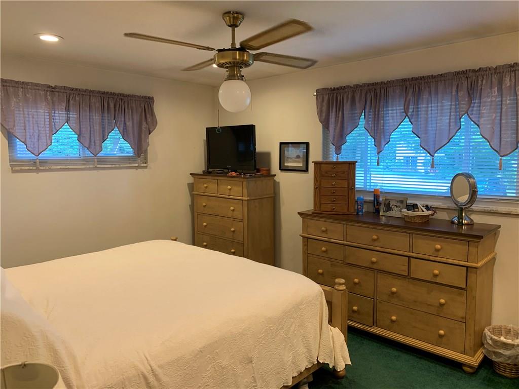 187 Warren Road Warrendale, PA 15086 - Photo 8 of 16 Master bedroom with two large windows and ceiling fan.