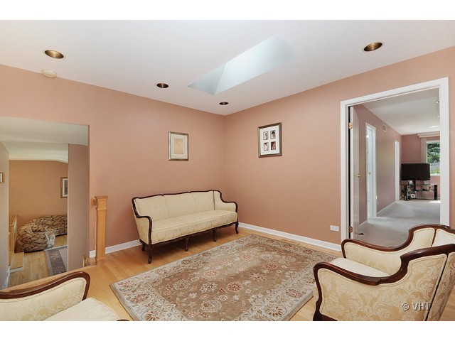 669 Ridge Road Highland Park, IL 60035 - Photo 12 of 16 a living room with furniture and a rug