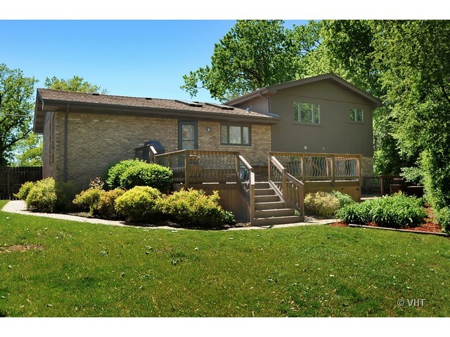 669 Ridge Road Highland Park, IL 60035 - Photo 15 of 16 a front view of a house with a yard and green space