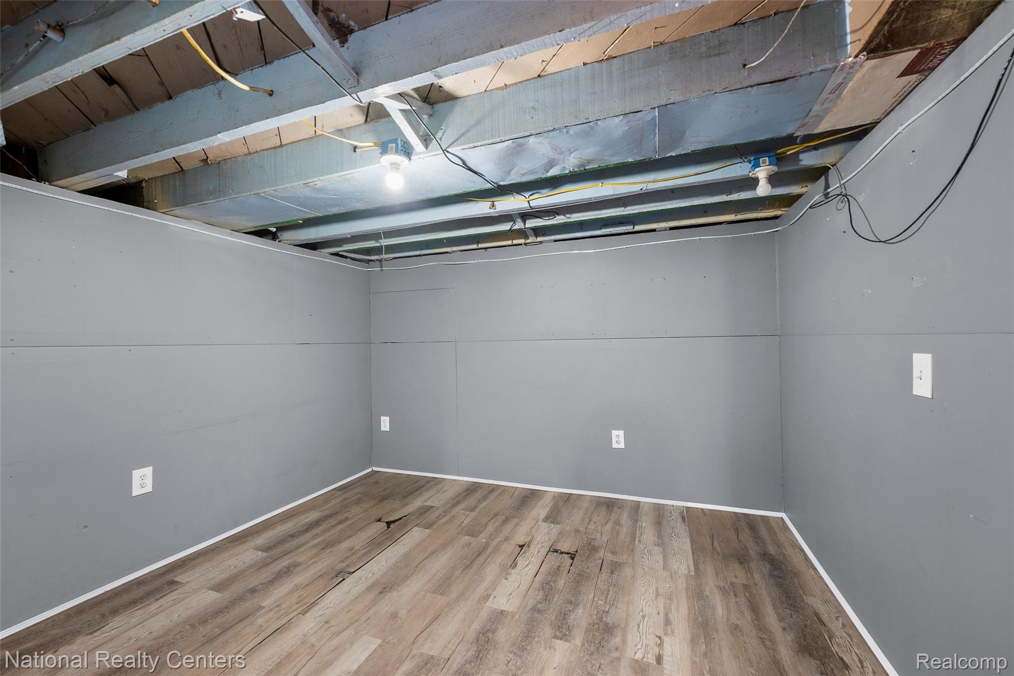 686 Perry Street Pontiac, MI 48342 - Photo 23 of 26 basement featuring light wood-style floors and baseboards