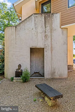a view of entryway with wooden floor and stairs