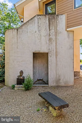 a view of entryway with wooden floor and stairs