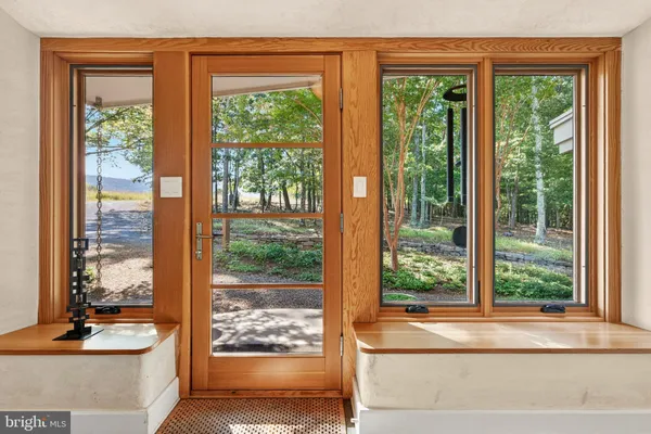 a kitchen with stainless steel appliances granite countertop a sink and a stove