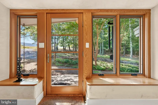 a kitchen with stainless steel appliances granite countertop a sink and a stove