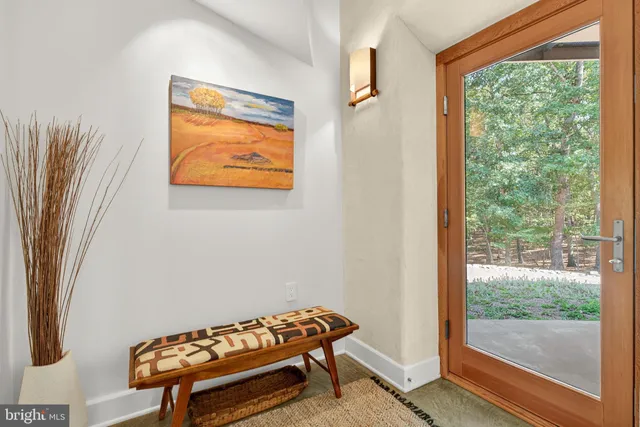a bathroom with a sink double vanity and a mirror
