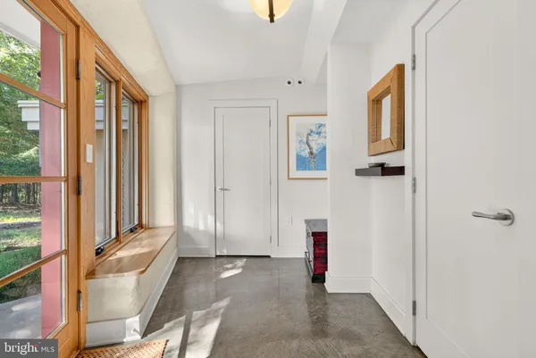 a kitchen with stainless steel appliances a sink and a microwave
