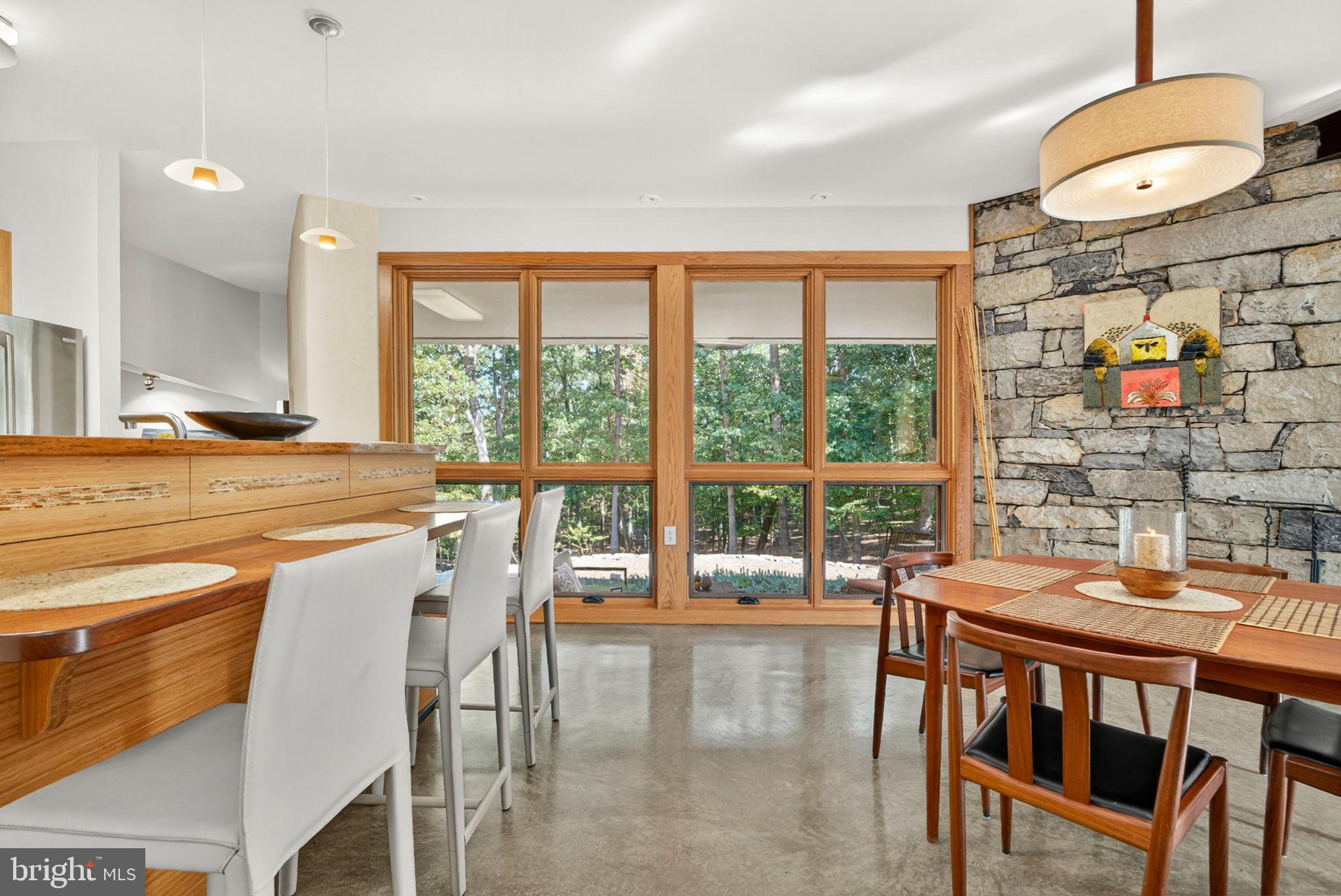 79 Marigold Way Gerrardstown, WV 25420 - Photo 29 of 140 a dining room with a table and chairs