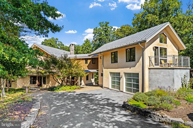 a front view of a house with a porch