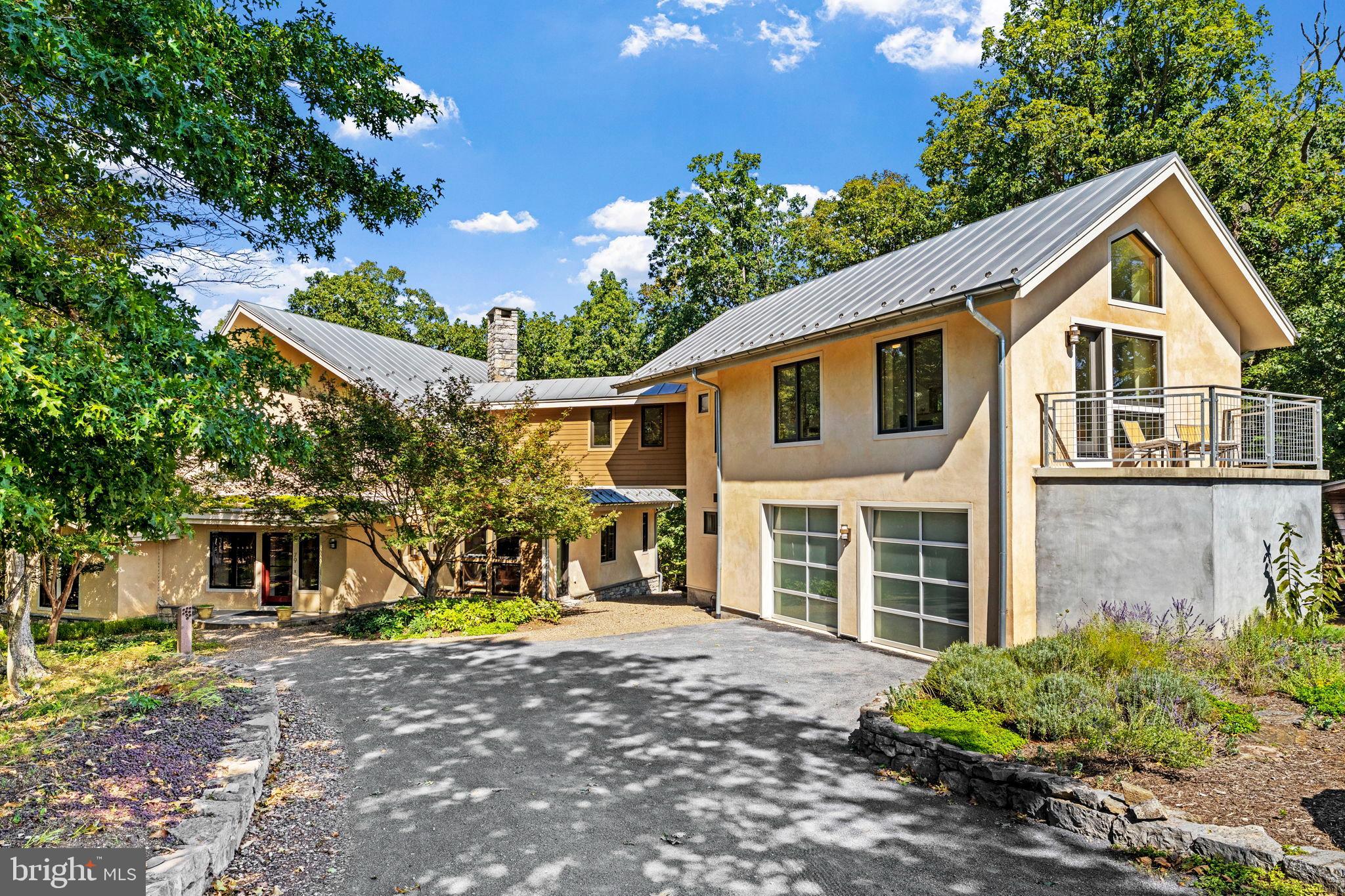 79 Marigold Way Gerrardstown, WV 25420 - Photo 6 of 140 Charming residence nestled in lush greenery.