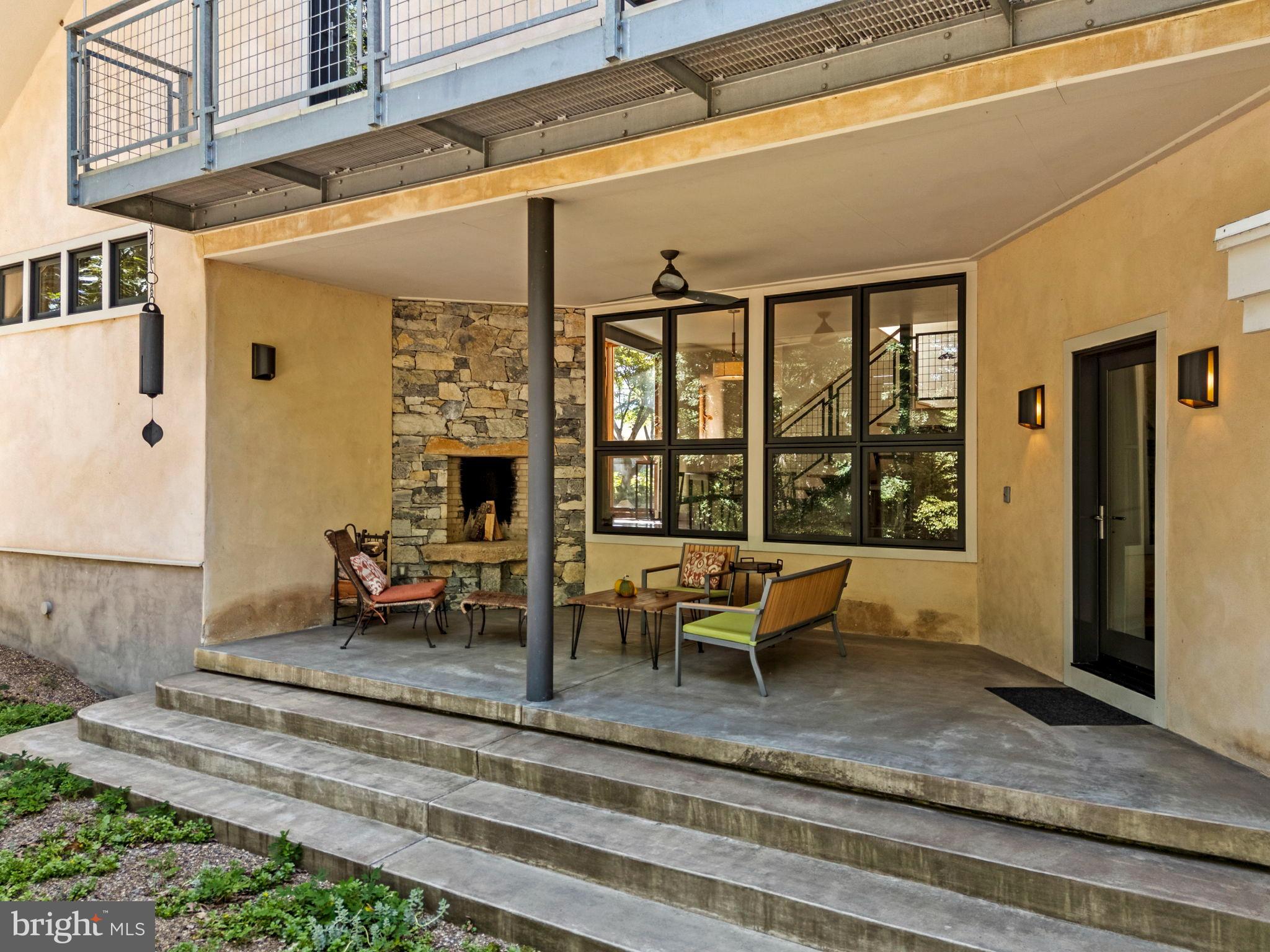 79 Marigold Way Gerrardstown, WV 25420 - Photo 67 of 140 a view of a patio with table and chairs with wooden floor and fence