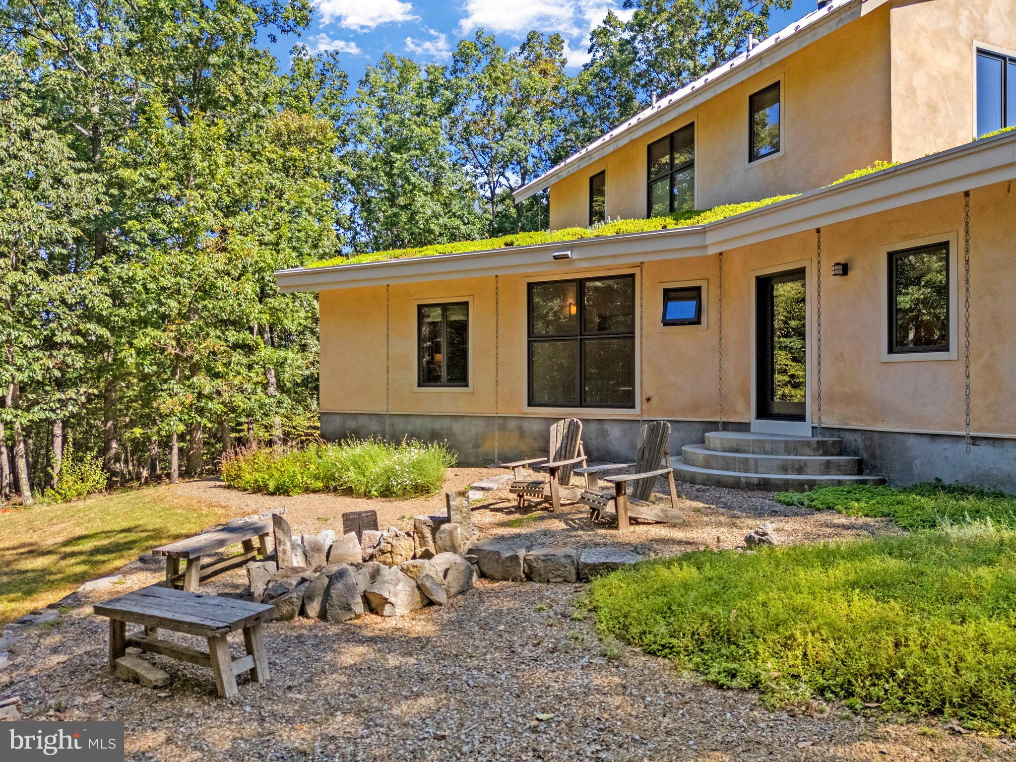 79 Marigold Way Gerrardstown, WV 25420 - Photo 70 of 140 a front view of a house with garden and sitting area