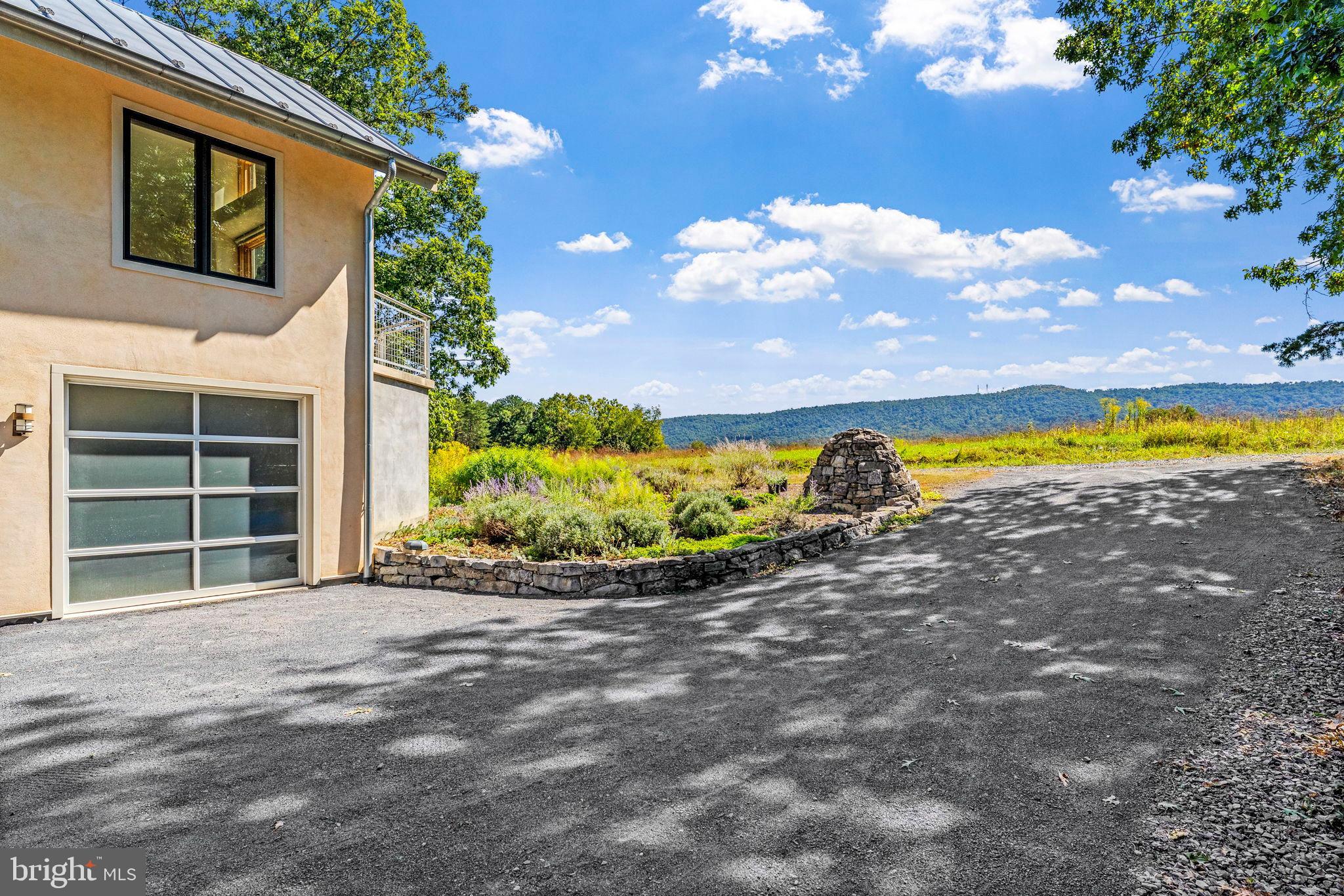 79 Marigold Way Gerrardstown, WV 25420 - Photo 7 of 140 a view of a house with outdoor space and a lake view
