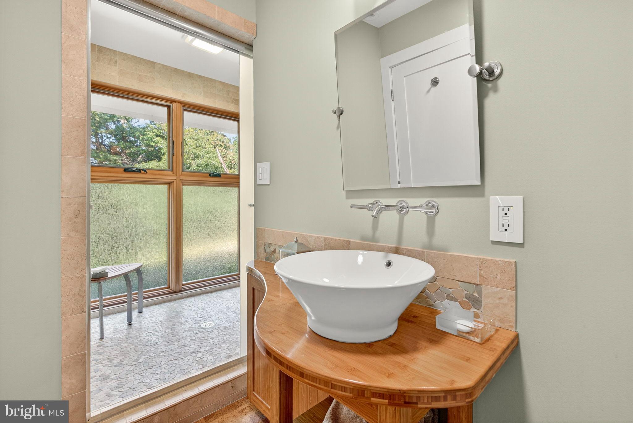 79 Marigold Way Gerrardstown, WV 25420 - Photo 88 of 140 a bathroom with a sink and a mirror