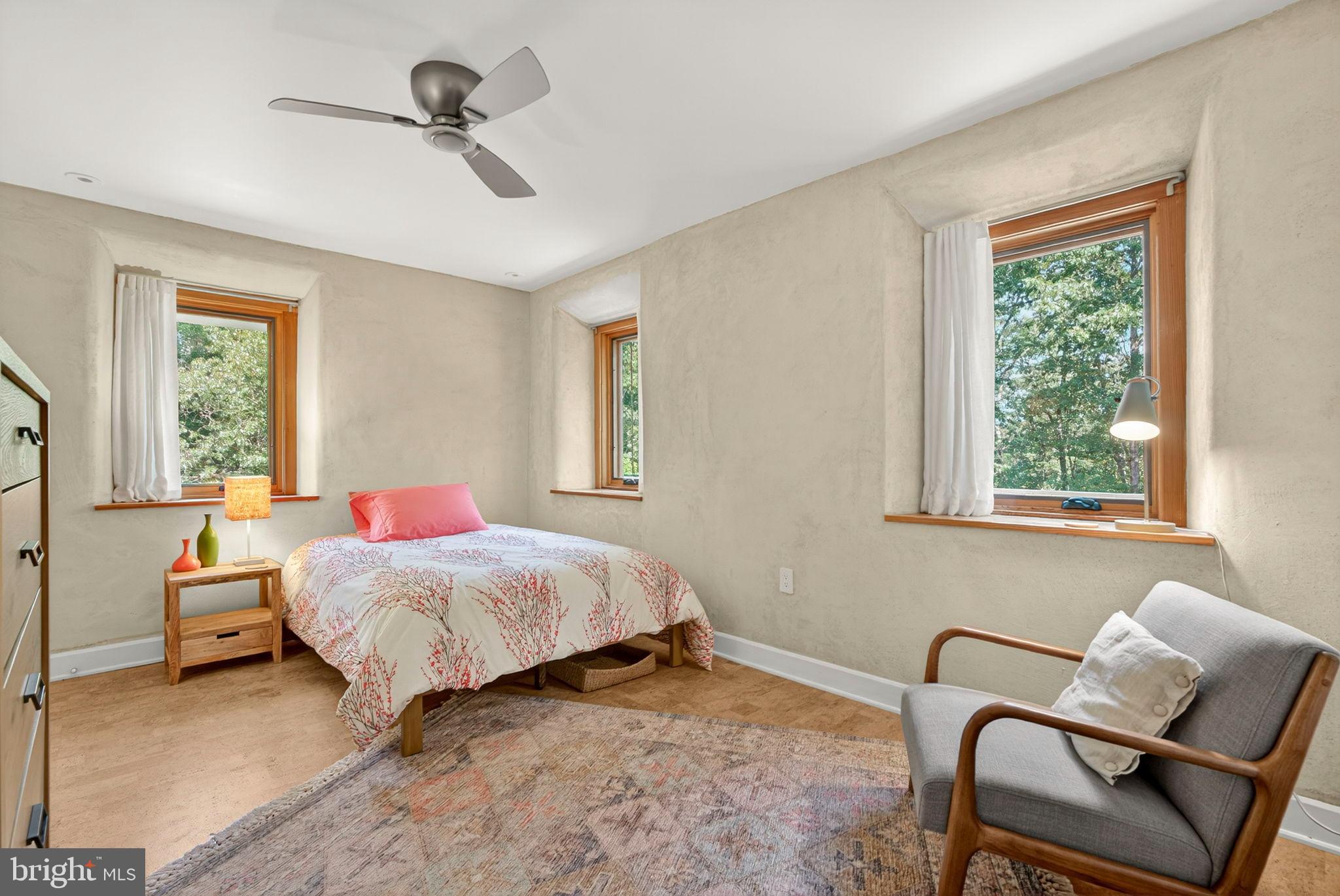 79 Marigold Way Gerrardstown, WV 25420 - Photo 96 of 140 a bedroom with a bed and wooden floor