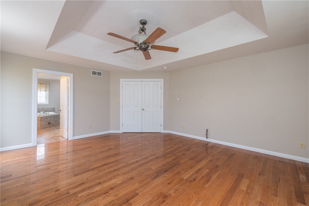 6426 Lake Bluff Road Huron, NY 14516 - Photo 21 of 50 Hardwood floors in the Primary Suite
