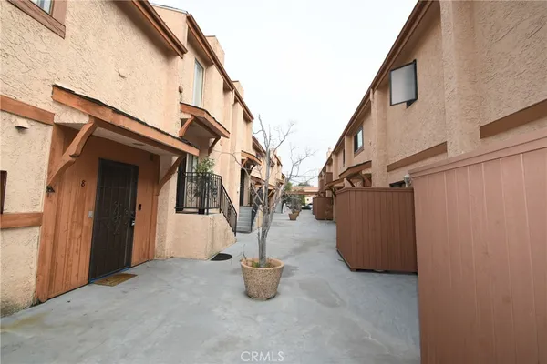 a view of a back yard of the house