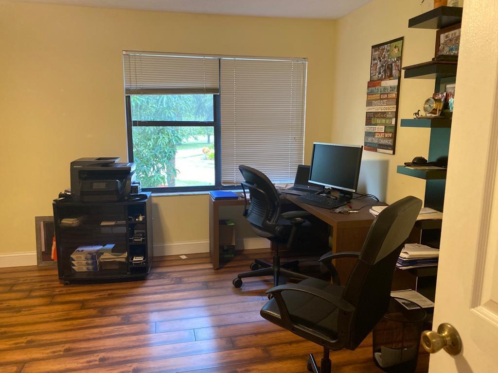 6657 Boca Hermosa Lane Boca Raton, FL 33433 - Photo 22 of 33 a view of a workspace with furniture and a window