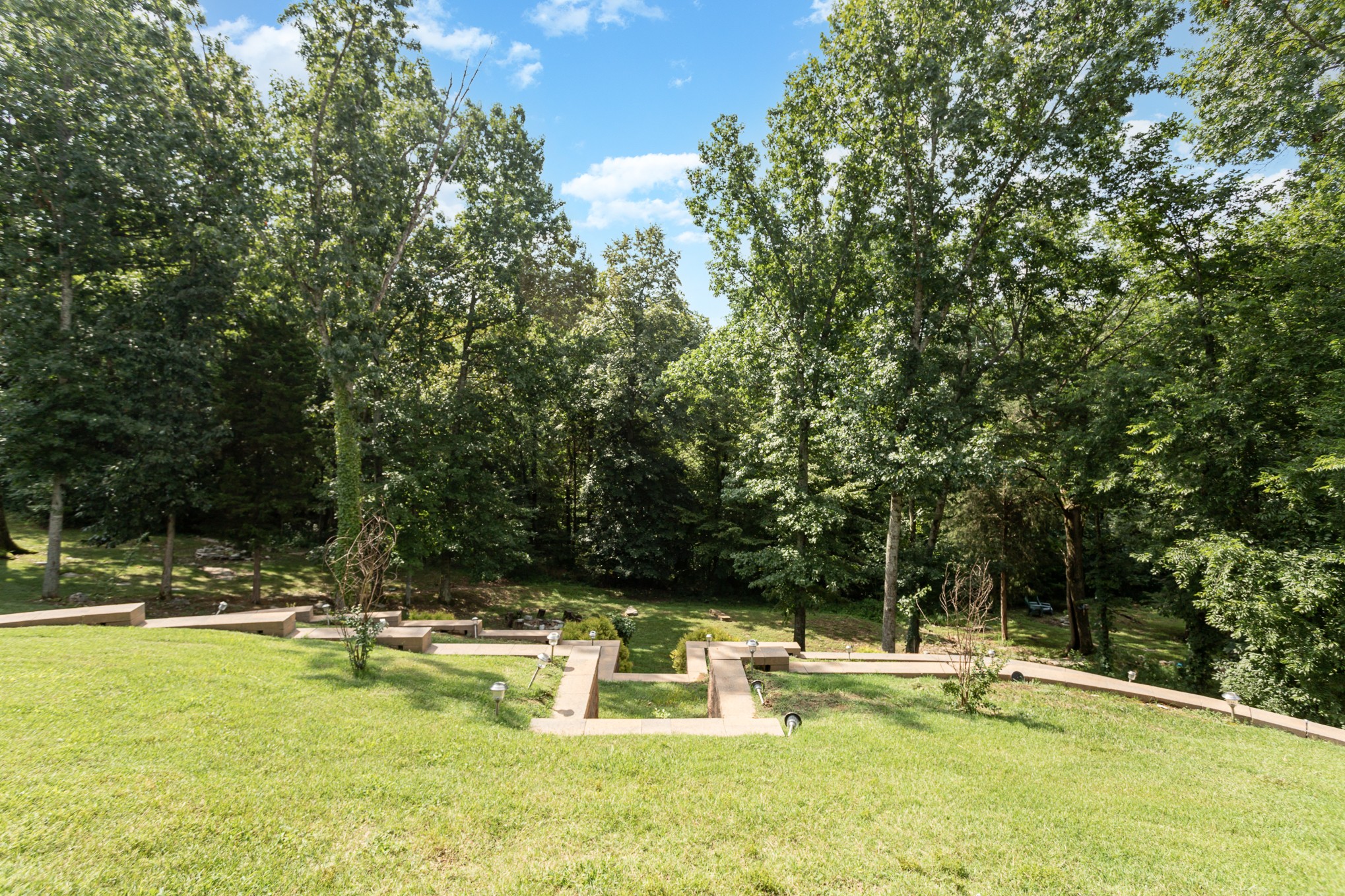 6772 Falls Ridge Lane College Grove, TN 37046 - Photo 8 of 68 a view of a swimming pool with a patio