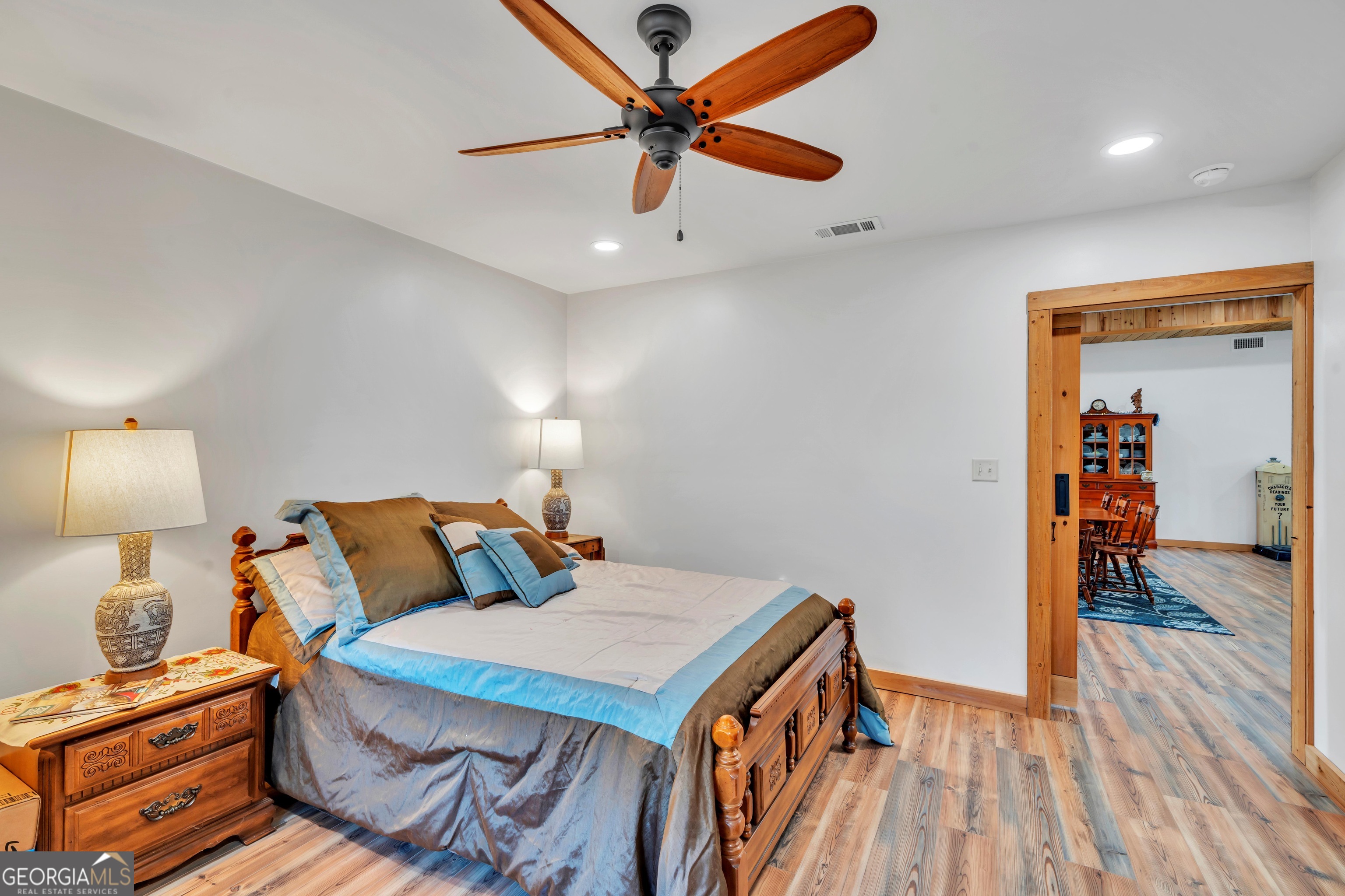 1864 Caulie Harris Road Adel, GA 31620 - Photo 26 of 78 a bedroom with a bed and a table