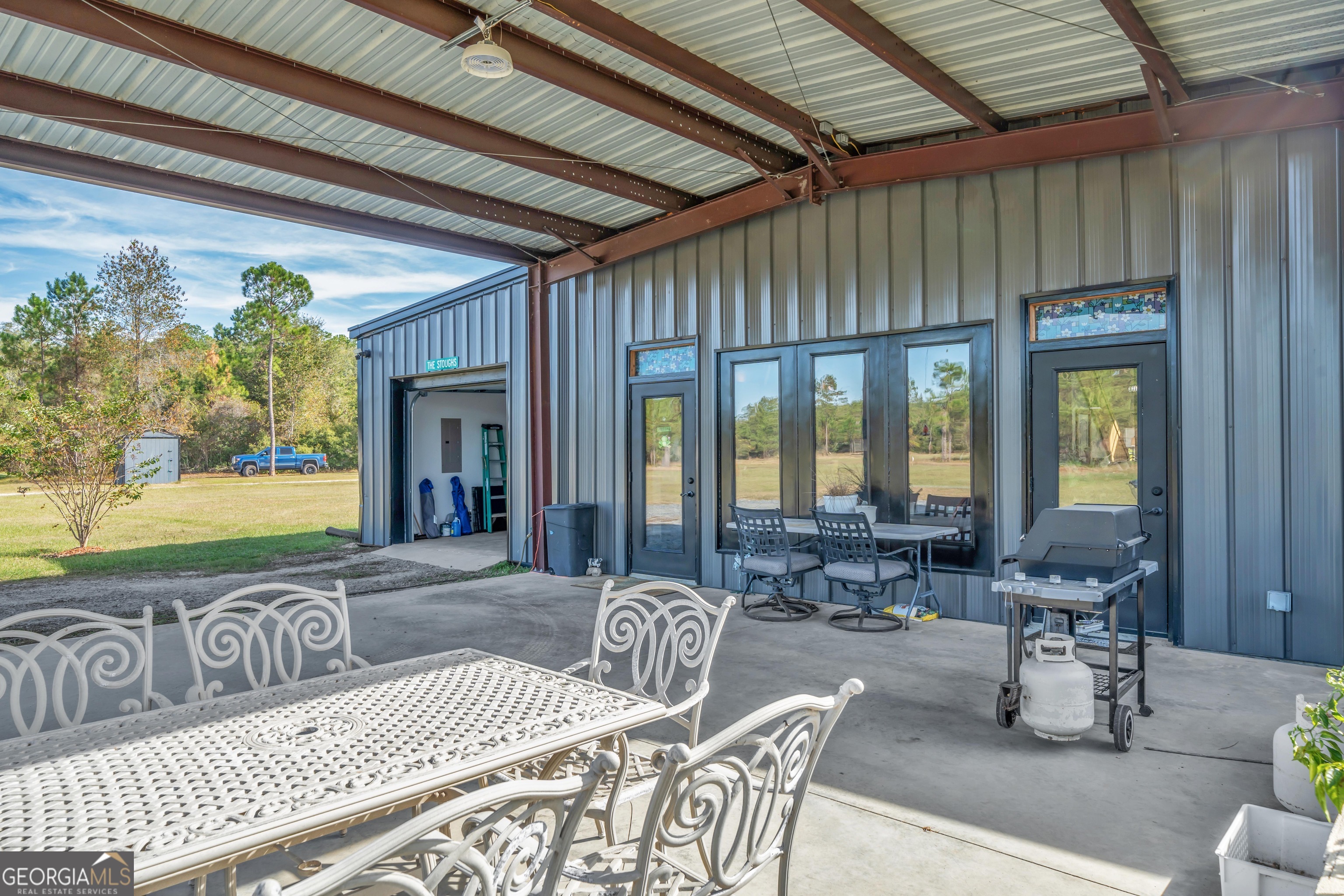 1864 Caulie Harris Road Adel, GA 31620 - Photo 37 of 78 a living room with furniture and a large window