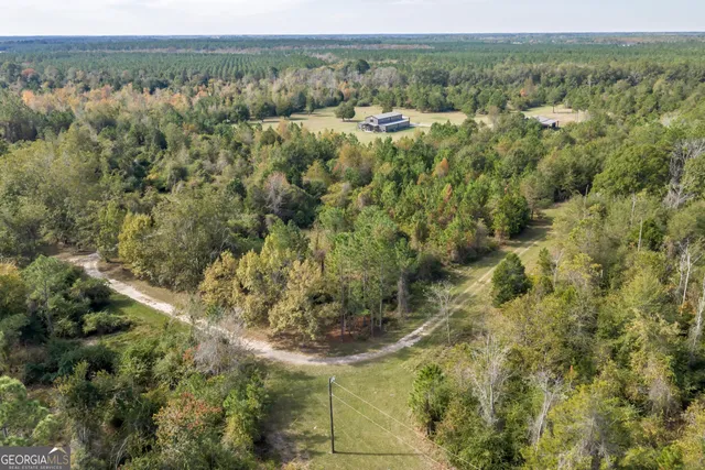 a view of a backyard of the house