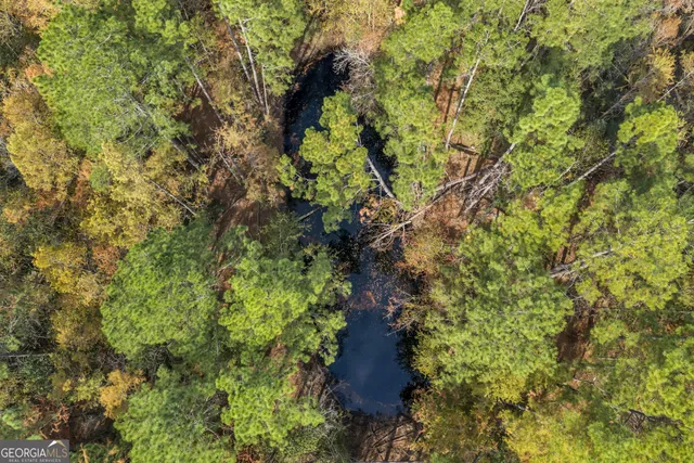 a view of a room with a fireplace