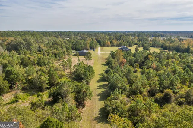 a picture of a bathroom with a shower