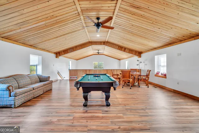 a room with furniture and wooden floors