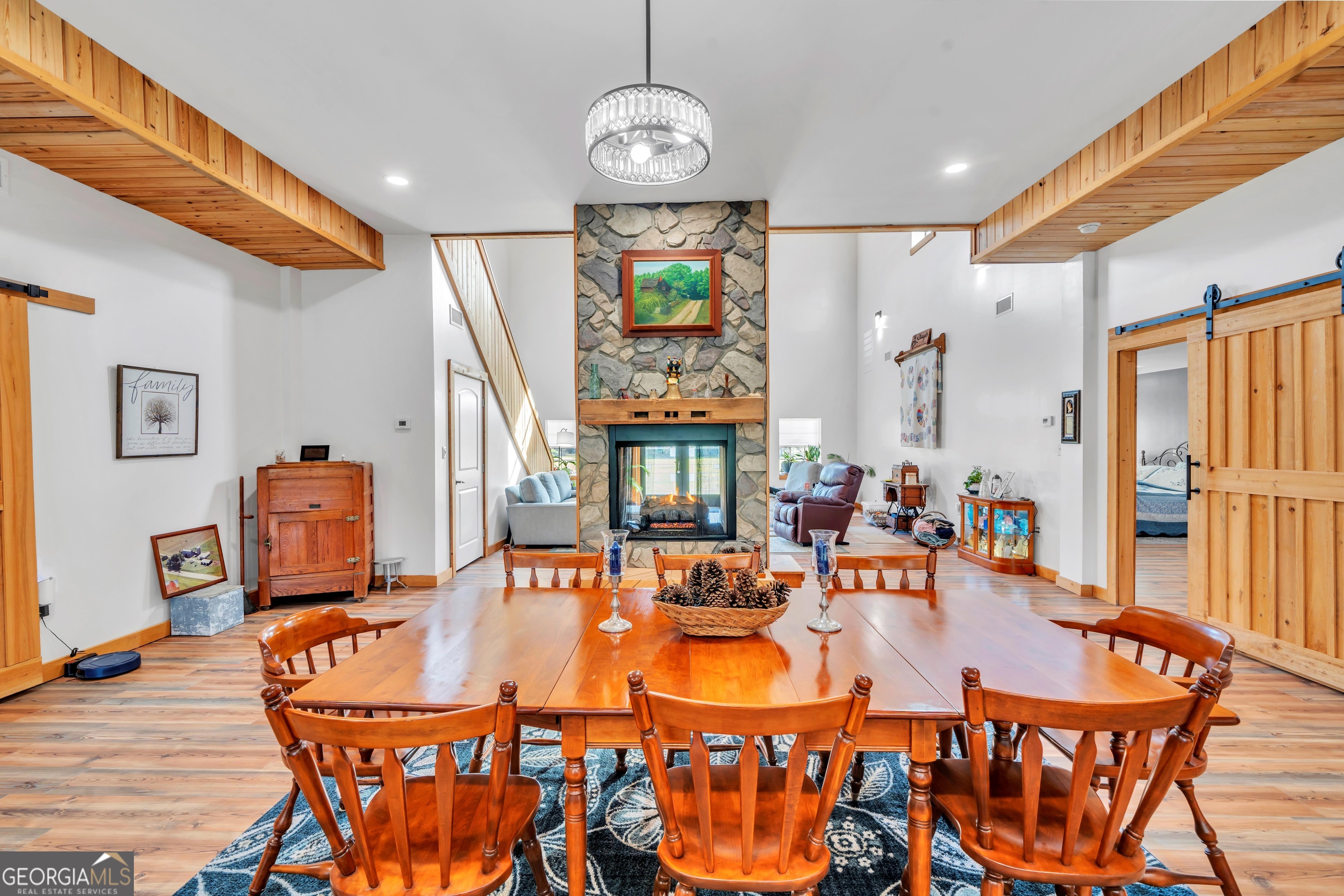 1864 Caulie Harris Road Adel, GA 31620 - Photo 10 of 78 a dining room with furniture a chandelier and wooden floor