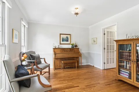 a room with furniture and a wooden floor