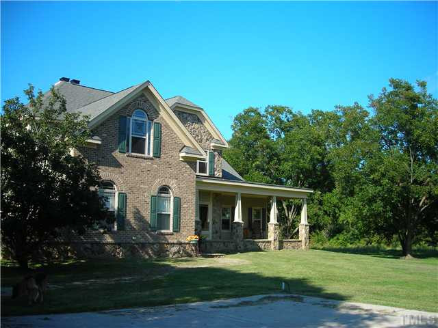 13384 Cleveland Road Garner, NC 27529 - Photo 5 of 5 a front view of a house with a yard