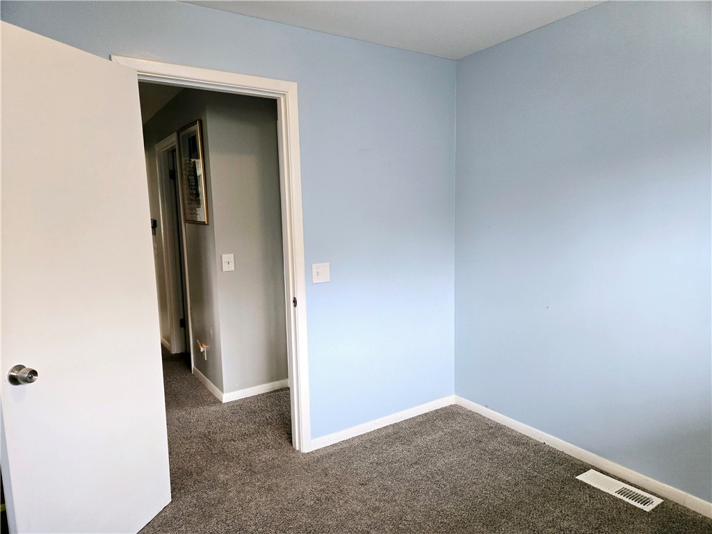 41 Hillhurst Lane Irondequoit, NY 14617 - Photo 15 of 42 This room is in between the other two bedrooms.