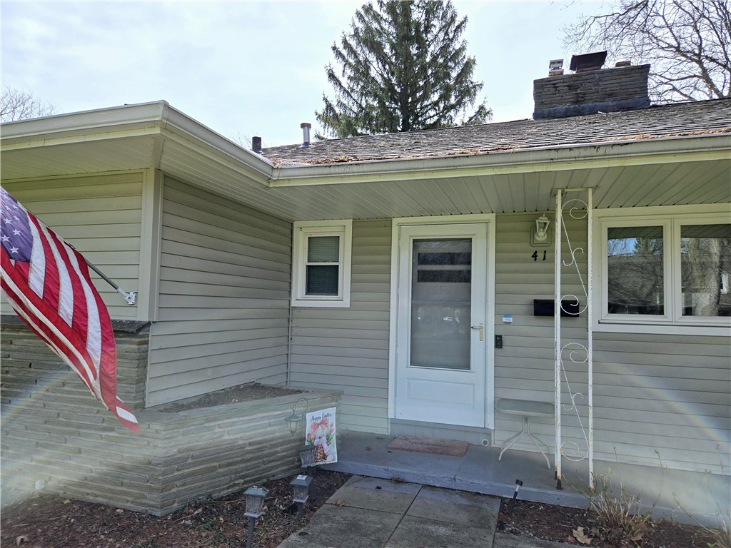 41 Hillhurst Lane Irondequoit, NY 14617 - Photo 2 of 42 The open front porch is perfect for morning coffee