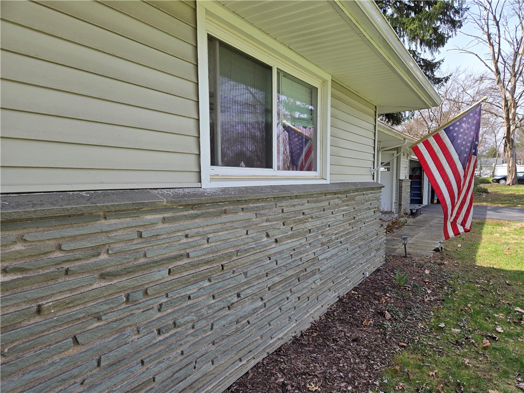 41 Hillhurst Lane Irondequoit, NY 14617 - Photo 35 of 42 Let's take a walk around the outside.