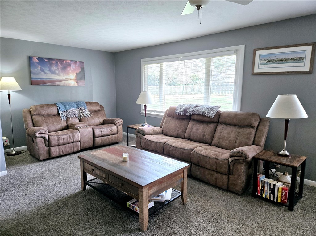 41 Hillhurst Lane Irondequoit, NY 14617 - Photo 9 of 42 Space for oversized furniture in the living room.