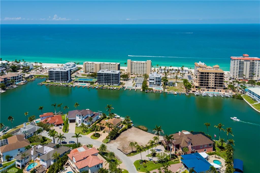 141 Conners Avenue Naples, FL 34108 - Photo 12 of 21 a view of a lake with a city view