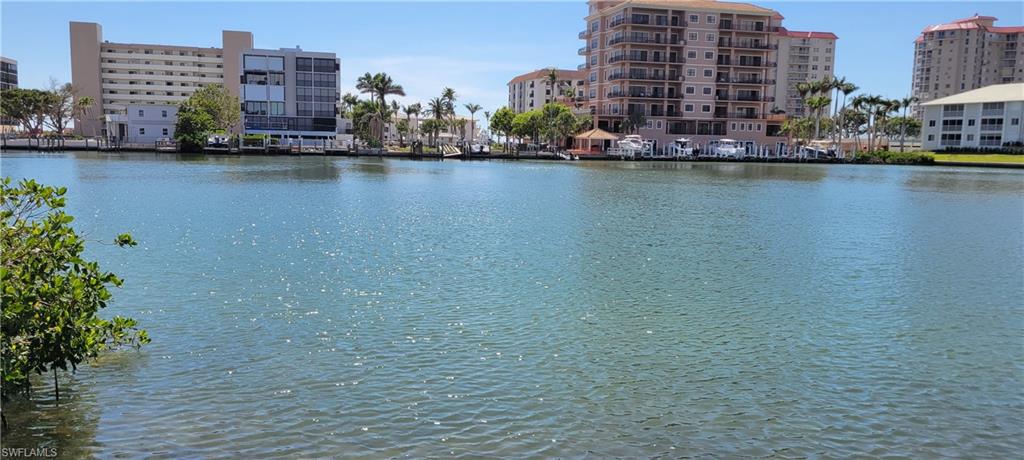 141 Conners Avenue Naples, FL 34108 - Photo 21 of 21 a view of a city with tall buildings