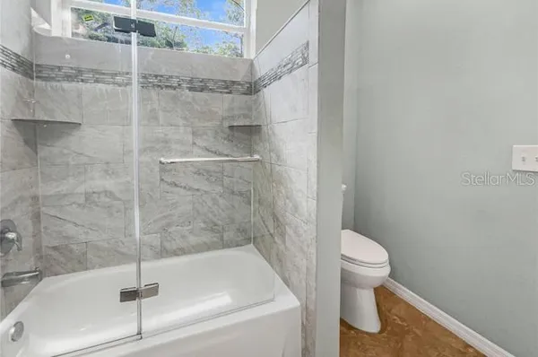 a bathroom with a sink and a shower