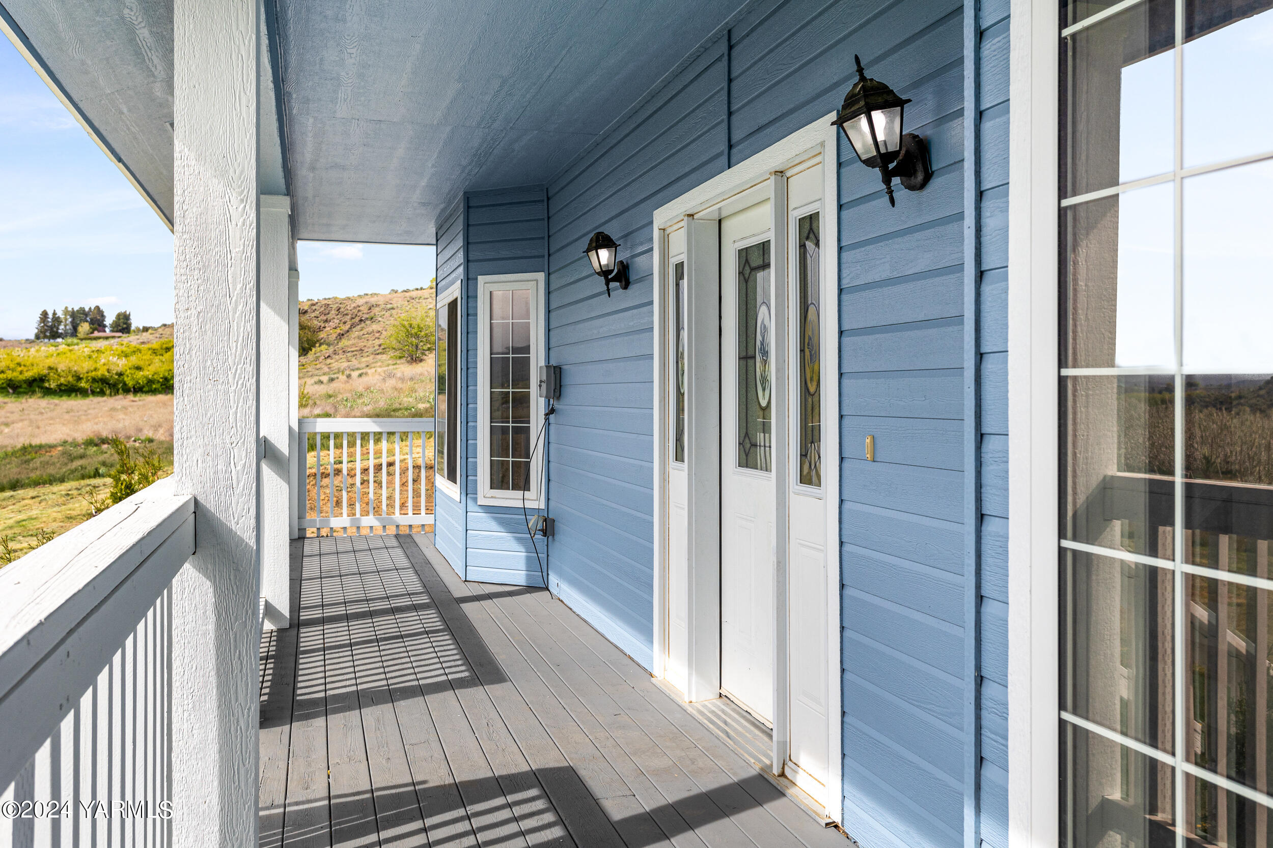 633 Hancock Road Cowiche, WA 98923 - Photo 12 of 53 a view of a balcony from door